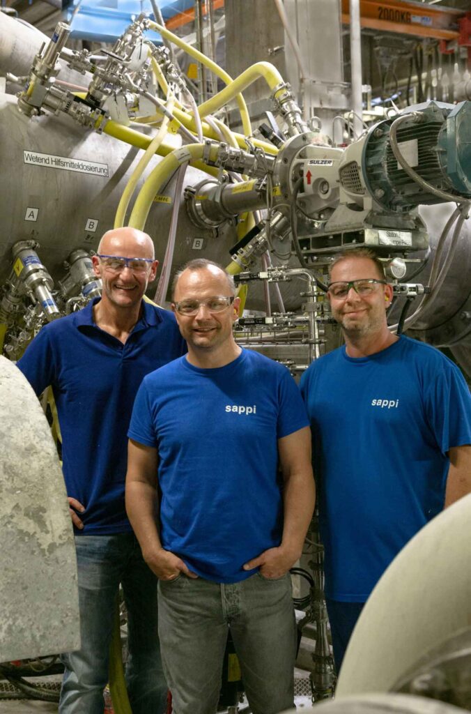 Happy with the mill results, the team from SAPPI Stockstadt Mill are posing  in front of the TrumpJet injection mixing installation