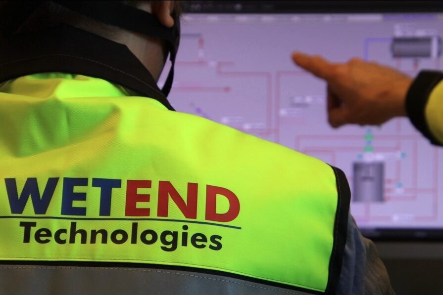 A Wetend expert is auditing the chemical mixing system of a paper machine for wet end optimization